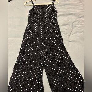 Black and white polka dot wide leg jumpsuit with adjustable straps